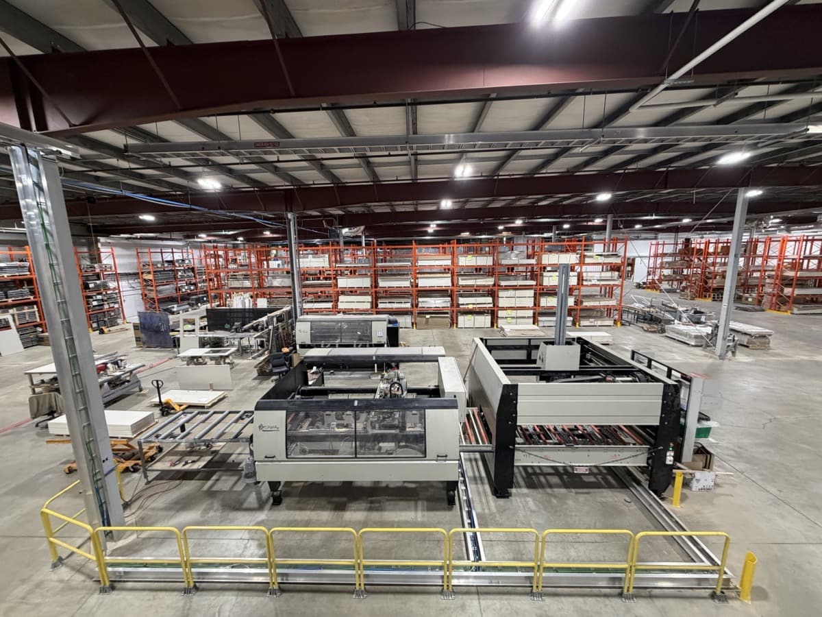 Manufacturing floor with equipment and warehouse racking